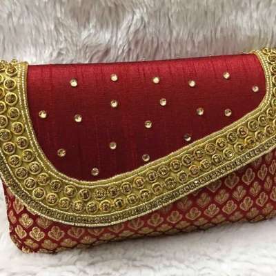 Shop for Maroon women handbags and purse Profile Picture